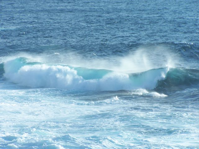 Crashing Ocean Waves on Clear Blue Day - Download Free Stock Photos Pikwizard.com