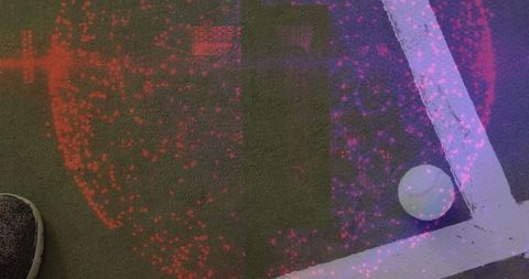 Tennis ball on court with intriguing light effects