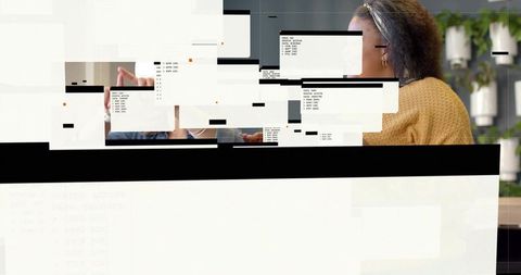 Listening mid-adult woman wearing mustard sweater headband with digital glitch overlays