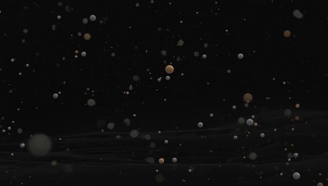 Floating spheres in dark void with bronze and gray tones