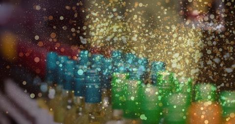 festive gold glitter overlay on wine bottles display - Download Free Stock Images Pikwizard.com
