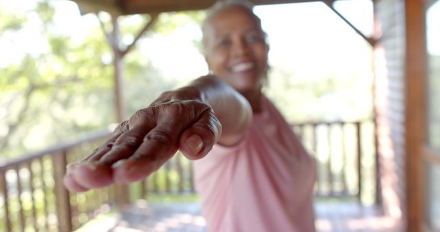 Senior Woman Yoga Bliss on Sunny Porch - Download Free Stock Images Pikwizard.com