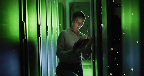 Professional Technician Working in Data Center with Futuristic Elements