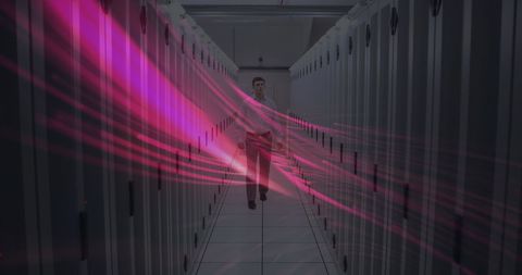 Person walking in data center with digital effects