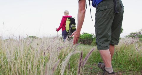Senior Hikers Exploring Nature with Backpacks - Download Free Stock Images Pikwizard.com