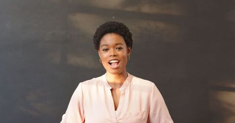 Confident businesswoman speaking in professional environment