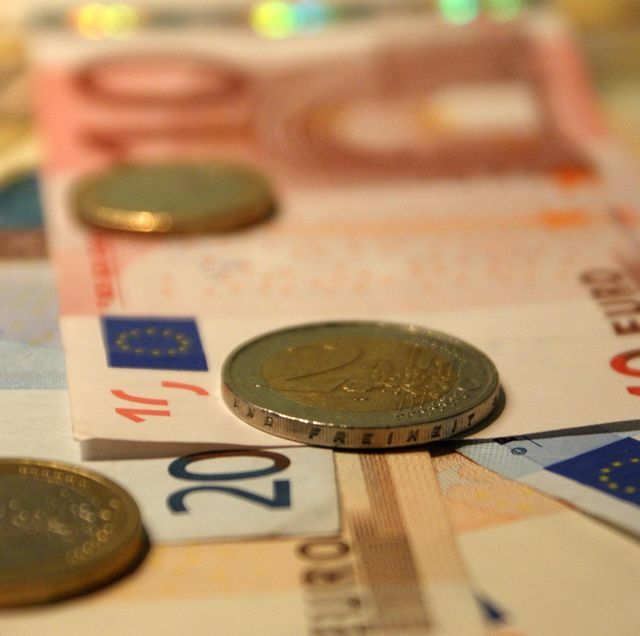 Close Up of Euro Bills and Coins Representing European Economy and Finance - Download Free Stock Photos Pikwizard.com