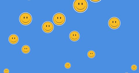 Smiley emojis floating on blue background for social media theme