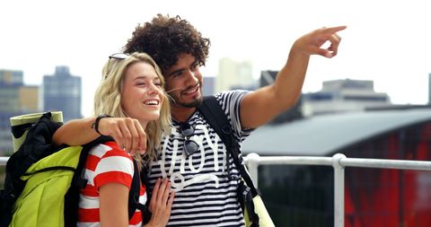 Young Tourists Enjoying City Adventure with Urban Backdrop