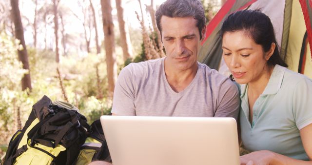 Couple Using Laptop Outdoors During Camping Trip - Download Free Stock Images Pikwizard.com