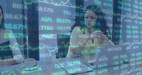 Diverse Female Manager Discussing Stock Market Strategy Overlay - Download Free Stock Images Pikwizard.com