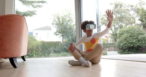 Curious African American Child Exploring Virtual Reality World