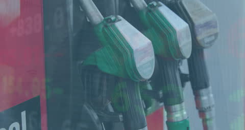 Fuel Nozzles Overlayed by Financial Data Graphics