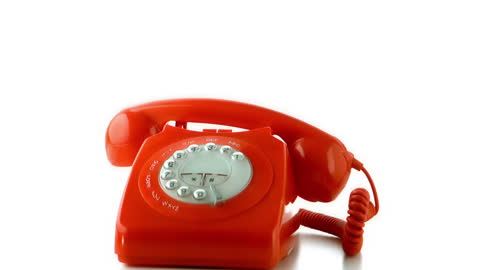 Red Rotary Phone with Receiver in Motion