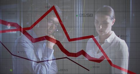 it engineers analyzing data overlaid with declining graph - Download Free Stock Images Pikwizard.com