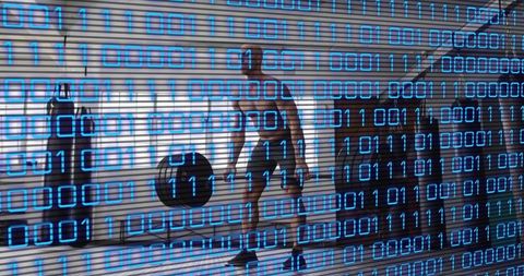 Shirtless man lifting kettlebell in gym under blue binary overlay fitness technology