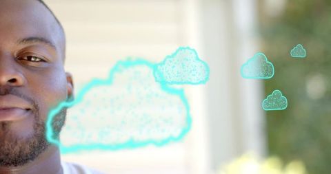 Smiling Black man leaning on pale siding with turquoise cloud doodles and copy space