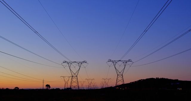 General view of electric pylons and clear sky with copy space. Electricity, energy, electric network concept.