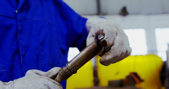 Mechanic Repairing Industrial Equipment with Wrench - Download Free Stock Images Pikwizard.com