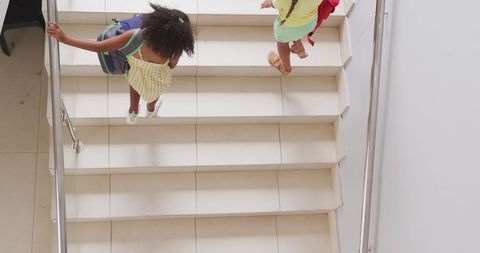 Diverse Girls Walking Up Stairs in School Environment - Download Free Stock Images Pikwizard.com