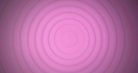 Pink concentric ring abstract background with glossy bullseye texture and subtle gradient
