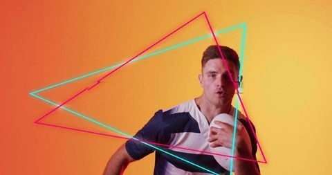 Dynamic Athlete Holding Ball Against Neon Geometric Bright Background