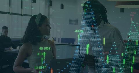 Colleagues in office discussing digital financial analytics