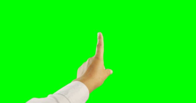 Hand pointing upward can be used in presentations, technology showcases, or interactive media projects. The green screen background allows for easy customization and integration in various contexts.