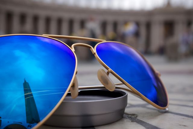 Reflective Blue Aviator Sunglasses with Historical Landmark - Download Free Stock Photos Pikwizard.com