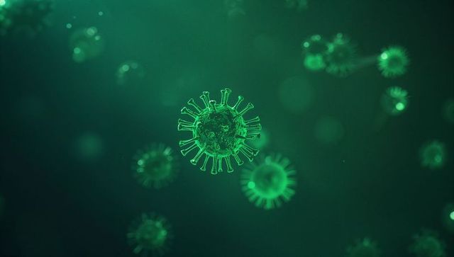 Green Glowing Virus Particles in Microscopic Scientific Biotech Scene