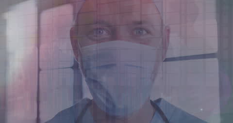 Doctor Analyzing Data Visualizations in Medical Mask