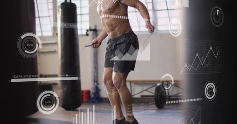 Shirtless man jumping rope in gym with digital hud tracking cardio and strength