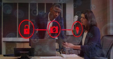 Business colleagues collaborating on digital security with tablet and laptop overlay