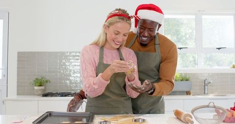 Joyful Couple Baking Together During Festive Holiday Season