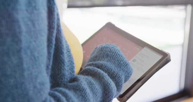 Woman Using Digital Tablet Outdoors in Sweater - Download Free Stock Images Pikwizard.com