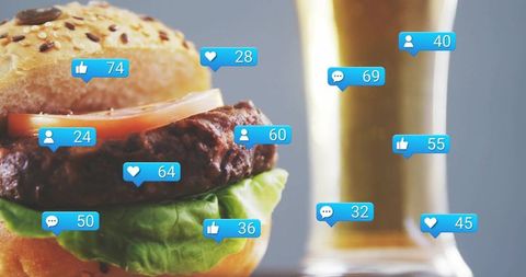 Displaying social media engagement around juicy burger and beer glass for food marketing