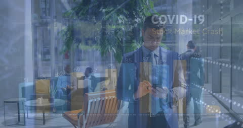 Businessman Analyzing Financial Data on Tablet with Technology Overlay