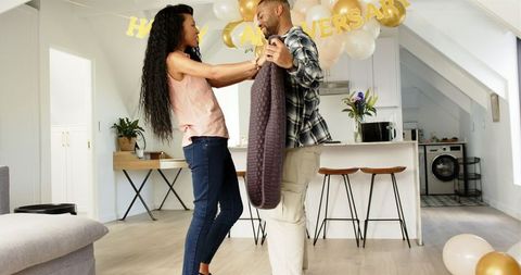 Couple Cleans Up After Home Anniversary Celebration