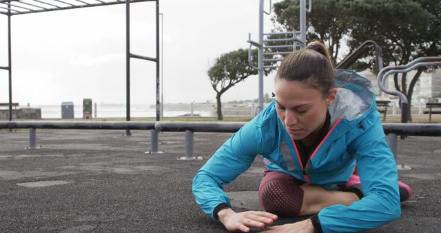 Woman Practicing Stretching Exercises at Outdoor Gym - Download Free Stock Images Pikwizard.com