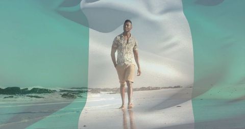 Young man walking sunlit shoreline with green-white translucent overlay for travel branding