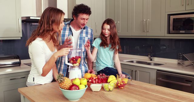 Family Preparing Healthy Fruit Smoothie in Kitchen - Download Free Stock Images Pikwizard.com