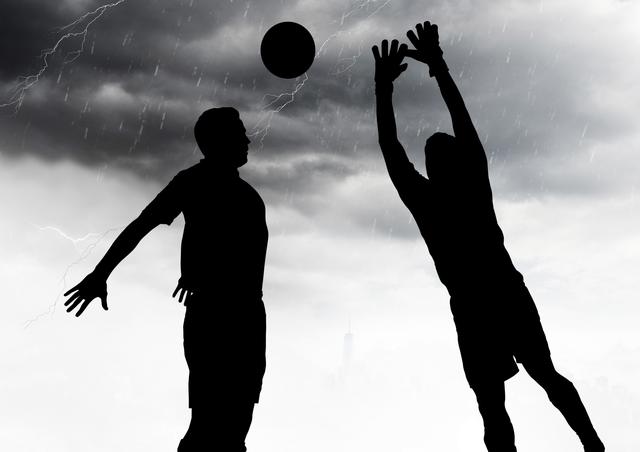 Digital composition of silhouette of players playing football against rainy background
