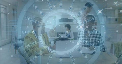 Startup team collaborating over laptop with holographic ui overlay in modern open office