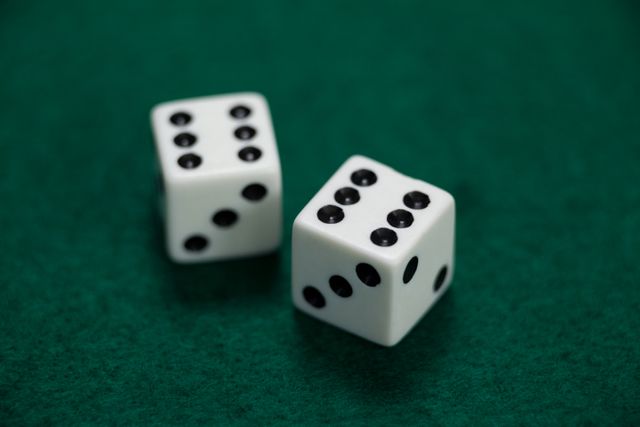 Pair of dice on poker table in casino