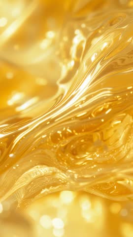 Looping glossy gold liquid macro video with reflective droplets and flowing shimmer