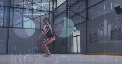 Youth gymnast crouching preparing to jump in black pink leotard with digital data overlays