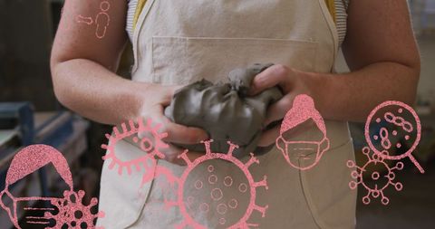 Potter creating artwork in covid-19 safe environment