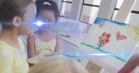 Creative Schoolchildren Painting in Art Class with Light Effects