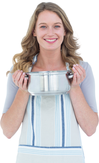 Smiling woman holding a stainless steel saucepan wearing an apron on a transparent background. Useful for culinary blogs, recipe websites, kitchen supply advertisements, and home cooking tutorials.