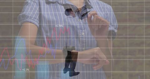 Businessman tapping smartwatch interface with holographic data graphs